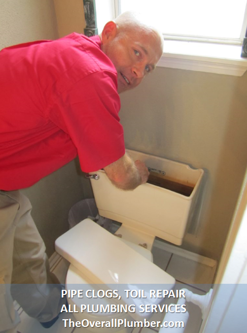 plumber-working-on-a-toilet-repair-emergency